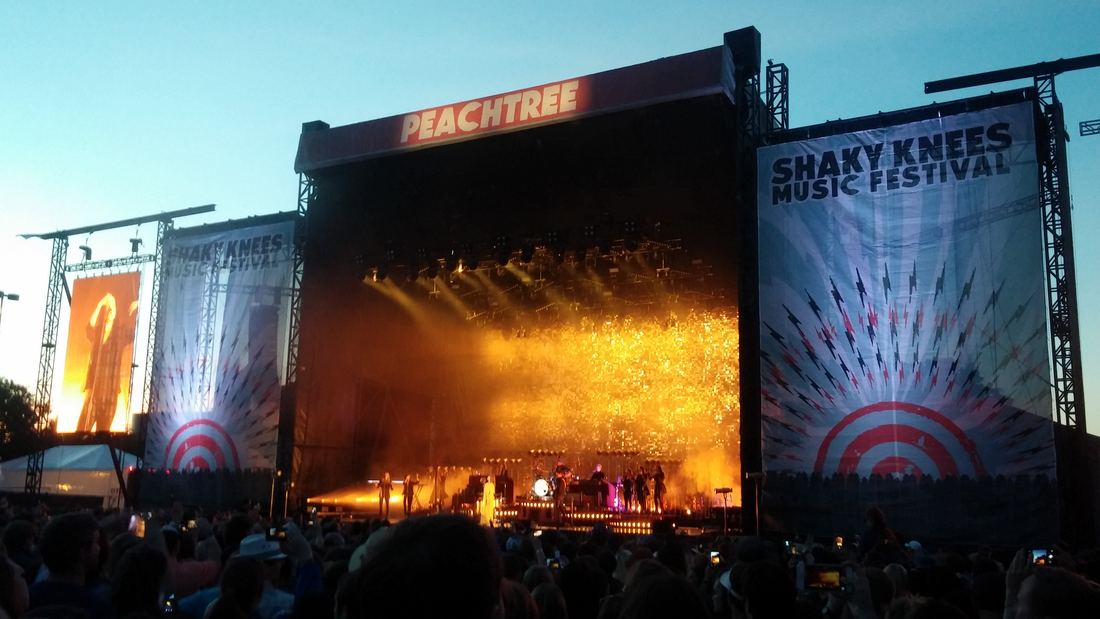 The lit-up main stage at Shaky Knees Music Festival at dusk