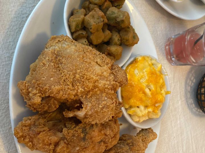 Plate of fried chicken with fried okra and macaroni and cheese at Mary Mac's Tea Room in Atlanta