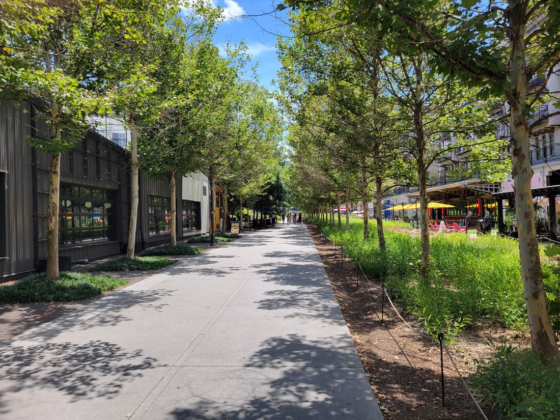 Tree-lined paved path of the Atlanta BeltLine Eastside Trail in Inman Park