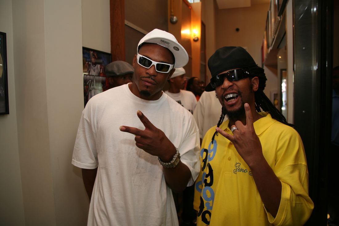 Fabo of D4L and Lil Jon posing together in sunglasses at an event
