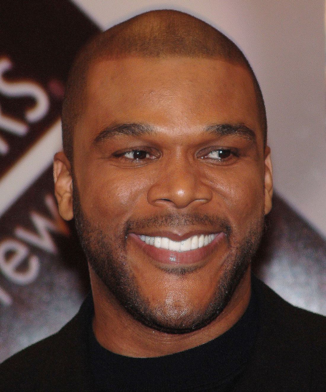 Close portrait of a smiling Tyler Perry